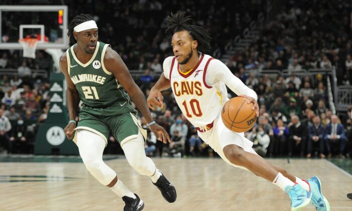 Cleveland Cavaliers guard Darius Garland (10) drives to the basket against Milwaukee Bucks guard Jrue Holiday (21) during an NBA game at Fiserv Forum, in Milwaukee, Wis., on Dec. 6, 2021. (Michael McLoone/USA TODAY Sports via Field Level Media)