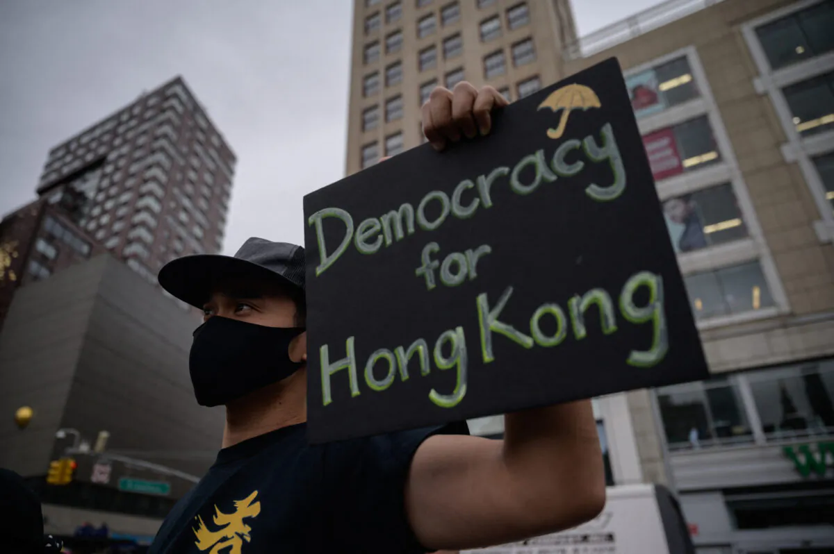 Demonstrators attend a rally in support of Hong Kong's pro-democracy movement at Union Square Park in Manhattan on June 12, 2021, in New York City. (Ed Jones/AFP via Getty Images)