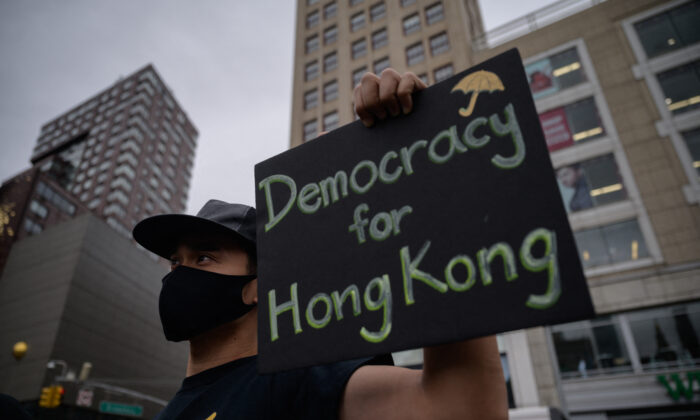 Demonstrators attend a rally in support of Hong Kong's pro-democracy movement at Union Square Park in Manhattan on June 12, 2021, in New York City. (Ed Jones/AFP via Getty Images)