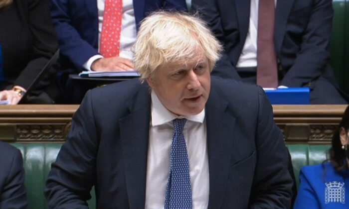 Prime Minister Boris Johnson speaks during Prime Minister's Questions in the House of Commons, London, on Dec. 8, 2021. (House of Commons/PA)