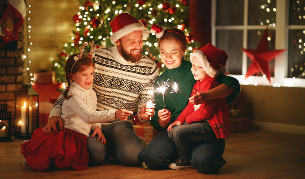 The holiday time is often a stressful time for many parents. Rather than choosing several gifts per child, you can opt to give less, and perhaps give more to a charity of your choice. (Evgeny Atamanenko/Shutterstock)