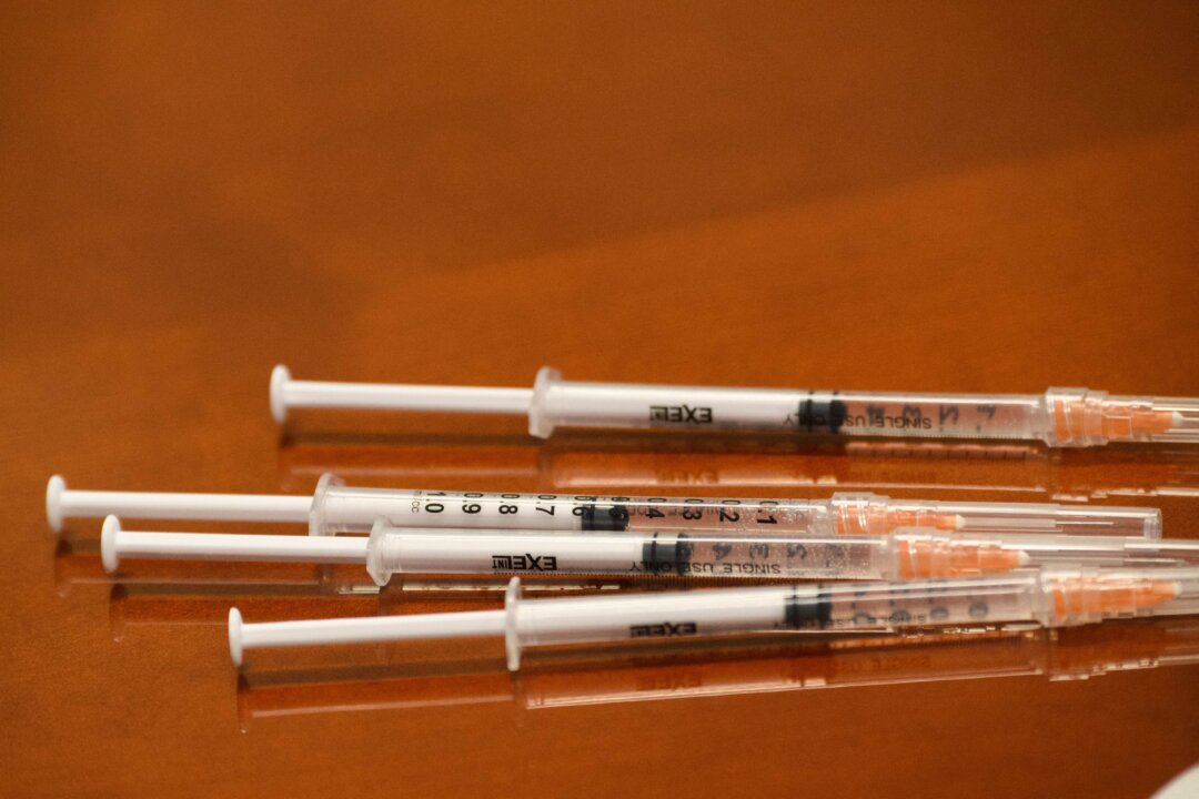 Syringes with doses of the Johnson & Johnson COVID-19 vaccine are seen in California in a file photograph. (Patrick T. Fallon/AFP via Getty Images)