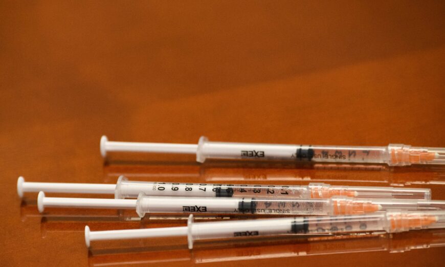 Syringes with doses of the Johnson & Johnson COVID-19 vaccine are seen in California in a file photograph. (Patrick T. Fallon/AFP via Getty Images)