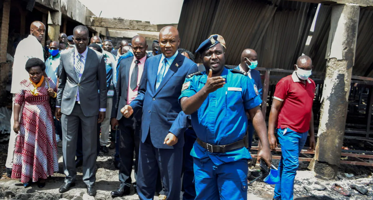 Burundi's Vice President Prosper Bazombanza visits the main prison where at least 38 inmates were killed and dozens more injured in a fire in Gitega, Burundi on Dec. 7, 2021. (Stringer/Reuters)