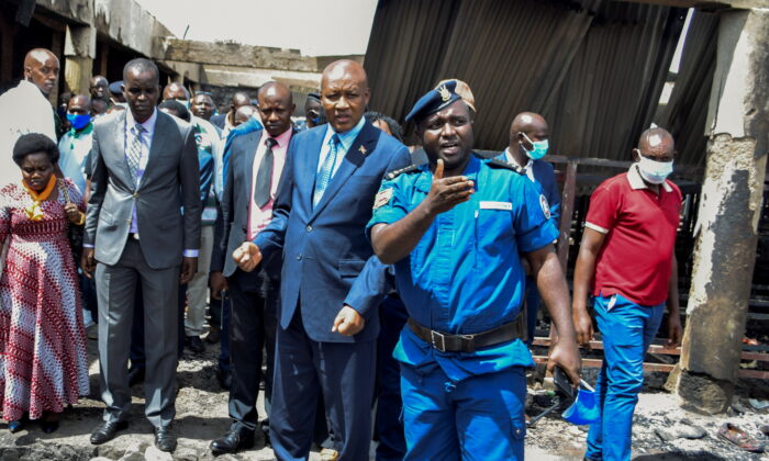 Burundi's Vice President Prosper Bazombanza visits the main prison where at least 38 inmates were killed and dozens more injured in a fire in Gitega, Burundi on Dec. 7, 2021. (Stringer/Reuters)
