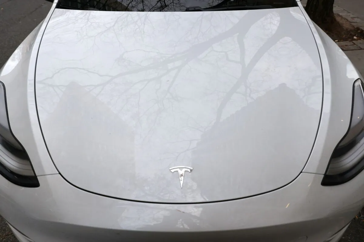 A Tesla electric vehicle is seen in Manhattan, N.Y., on Dec. 7, 2021. (Andrew Kelly/Reuters)