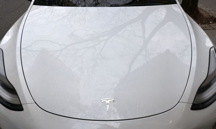 A Tesla electric vehicle is seen in Manhattan, N.Y., on Dec. 7, 2021. (Andrew Kelly/Reuters)