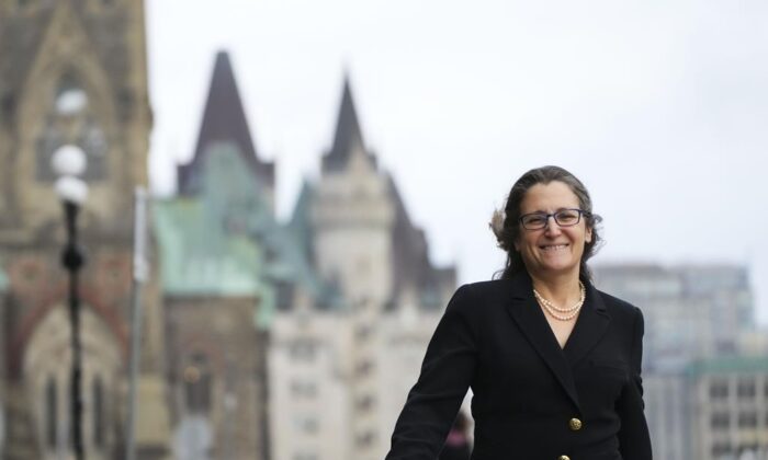 Commons 20211202
Minister of Finance and Deputy Prime Minister Chrystia Freeland makes her way to the West Block on Parliament Hill in Ottawa, Dec. 2, 2021. ( Canadian Press/Sean Kilpatrick)