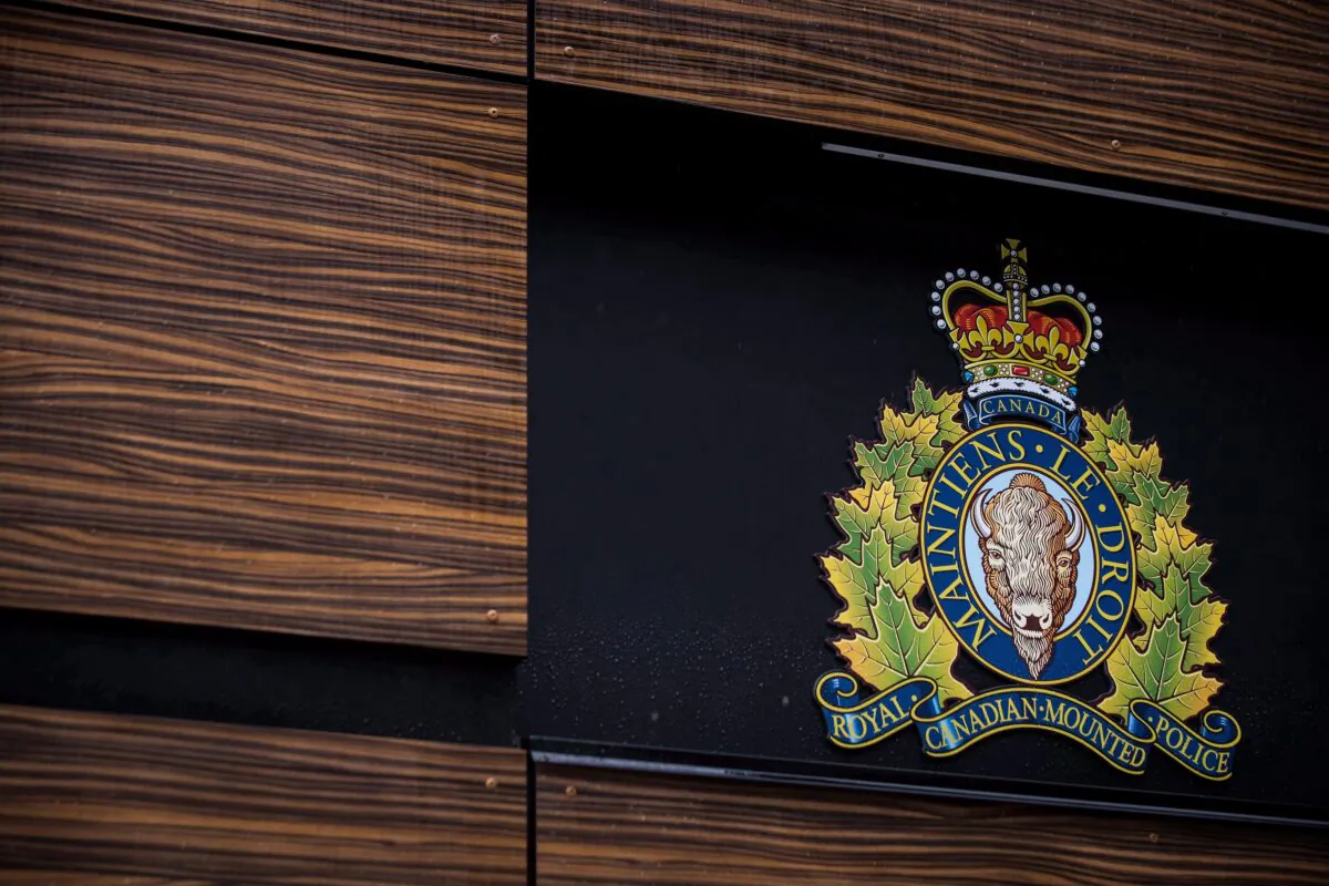 The RCMP logo is seen outside Royal Canadian Mounted Police "E" Division Headquarters, in Surrey, B.C., on April 13, 2018. (Darryl Dyck/The Canadian Press)