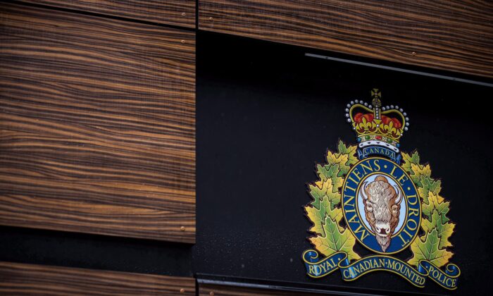 The RCMP logo is seen outside Royal Canadian Mounted Police "E" Division Headquarters in Surrey, B.C., on April 13, 2018. (Darryl Dyck/The Canadian Press)