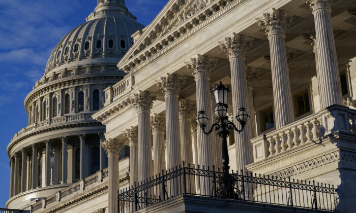 Light from the morning sun illuminates the Capitol on Dec. 3, 2021.  (J. Scott Applewhite/AP Photo)