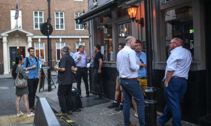 Office workers drink outside a pub in London, on Sept. 8, 2021. (Peter Summers/Getty Images)