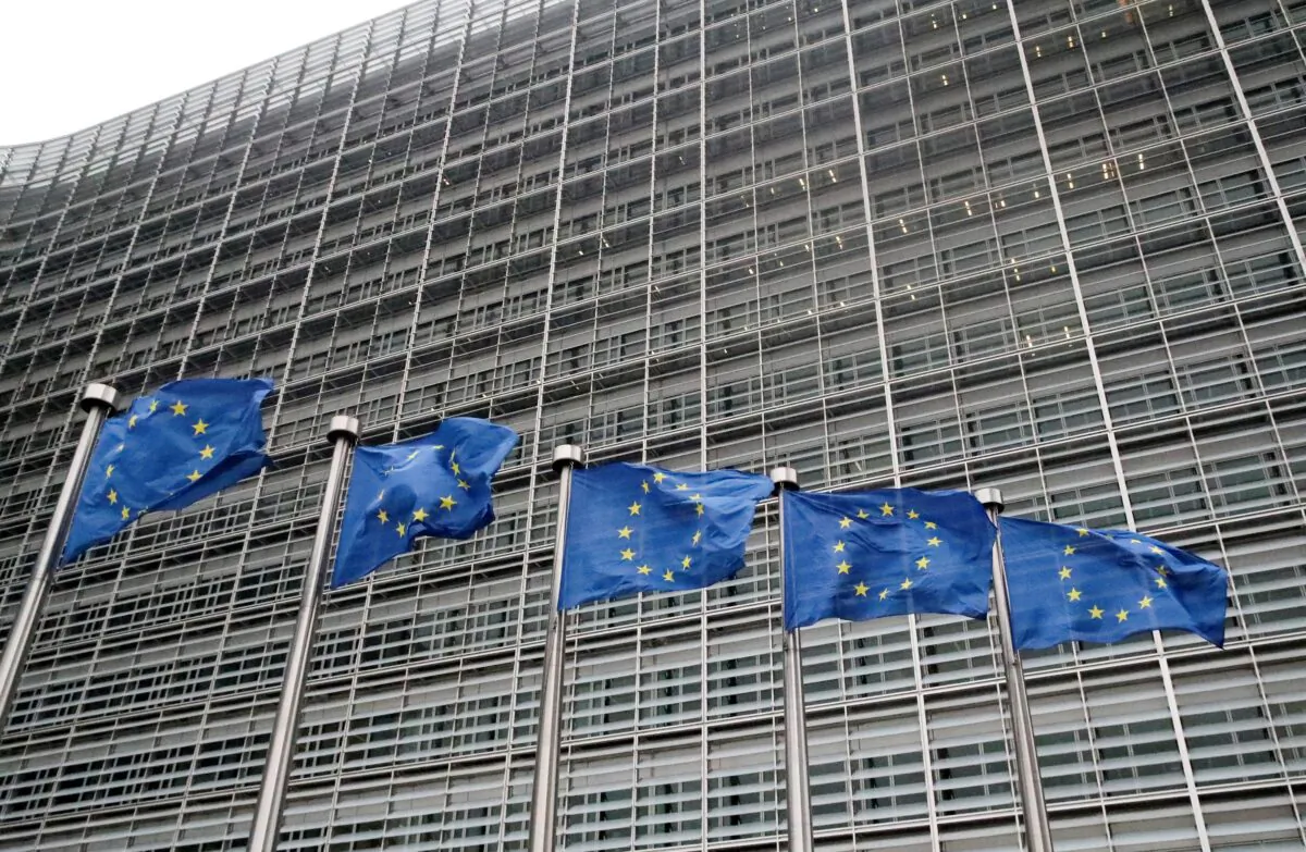 European Union flags flutter outside the EU Commission headquarters in Brussels, Belgium, on July 14, 2021. (Yves Herman/Reuters)