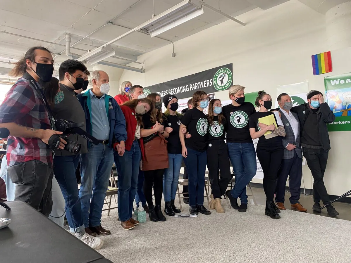 Starbucks employees wait for results of a vote count, in Buffalo, N.Y., on Dec. 9, 2021. (Eleonore Sens/AFP via Getty Images)