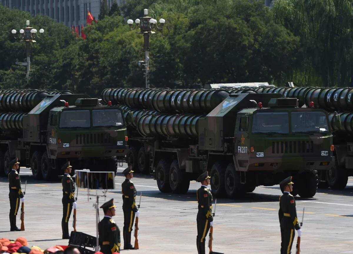 Chinese People's Liberation Army HQ-9 surface-to-air missile launchers are seen during a military parade at Tiananmen Square in Beijing on Sep. 3, 2015. A modified version of this missile was used to shoot down a satellite in a test by China in 2007. (Greg Baker/AFP via Getty Images)