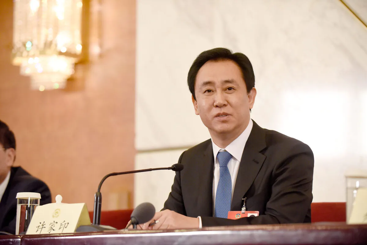 Xu Jiayin, Chairman of the Board of Evergrande Group, held the distinction of being the sole Standing Committee Member of the Chinese People's Political Consultative Conference (CPPCC) from the private entrepreneur domain. The photo shows him at a news conference on the sidelines of the 12th National People's Congress in Beijing, China , on March 6, 2016. (Etienne Oliveau/Getty Images)