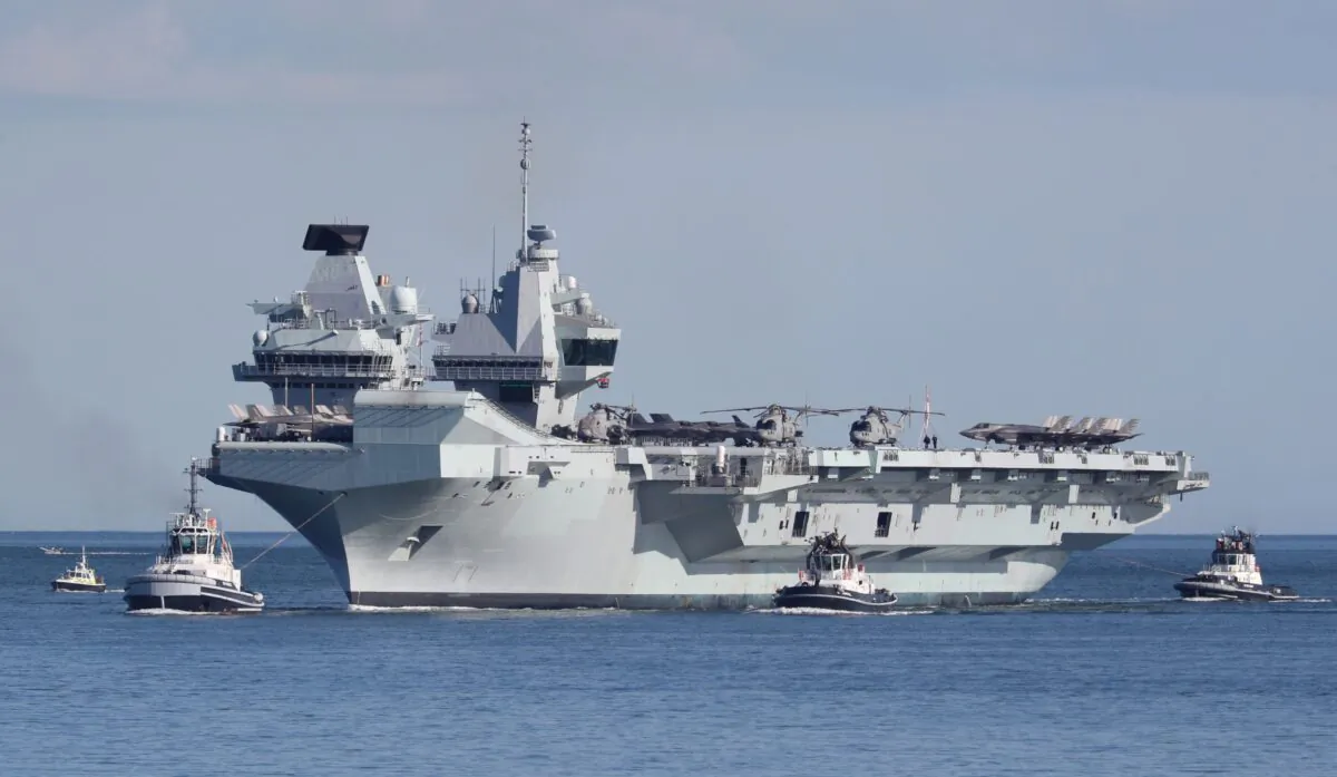 The Royal Navy’s flagship, HMS Queen Elizabeth pictured before returning to the Portsmouth in the UK on Dec. 9, 2021. (Andrew Matthews/PA)