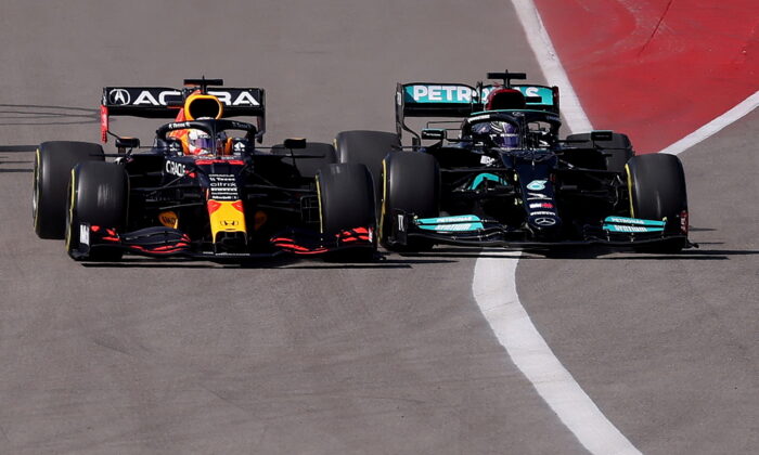 Red Bull's Max Verstappen and Mercedes' Lewis Hamilton in action at the start of the Formula One F1 - United States Grand Prix - Circuit of the Americas in Austin, Texas, U.S. on Oct. 24, 2021. (Mike Blake/Reuters)