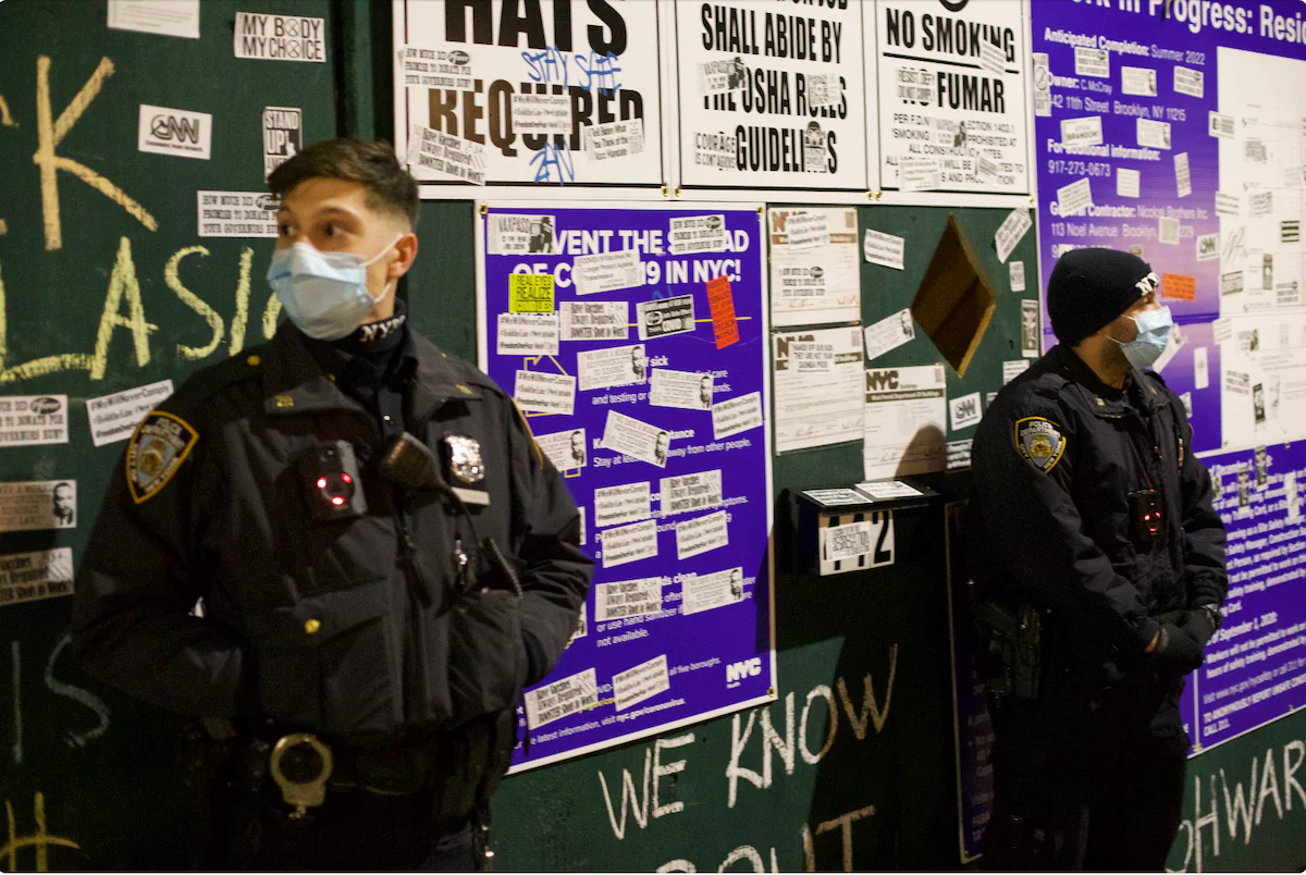 Police outside Bill de Blasio's residence in Brooklyn, New York, on Dec. 8, 2021. (Enrico Trigoso/The Epoch Times)