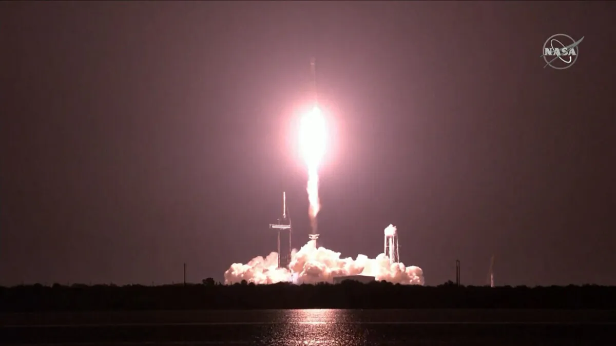 Views of SpaceX Falcon 9 rocket climbing, on Dec. 9, 2021, in a still from video. (NASA TV/AP/Screenshot via The Epoch Times)