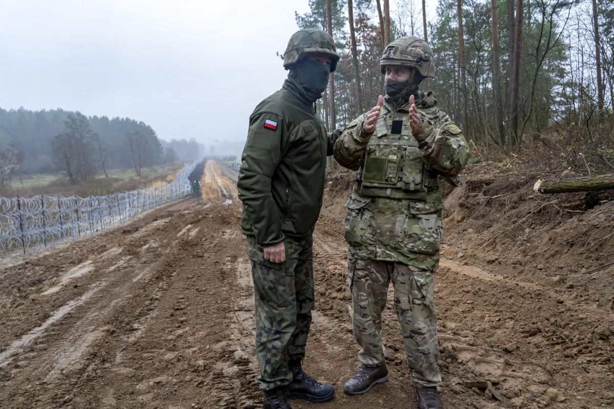 Undated handout photo of British troops in Poland at the border with Belarus, issued by the UK Ministry of Defence on Dec. 9, 2021. (PA)