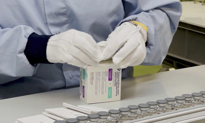 A worker packages the AstraZeneca’s Evusheld medication in an undated video. (AstraZeneca via AP)