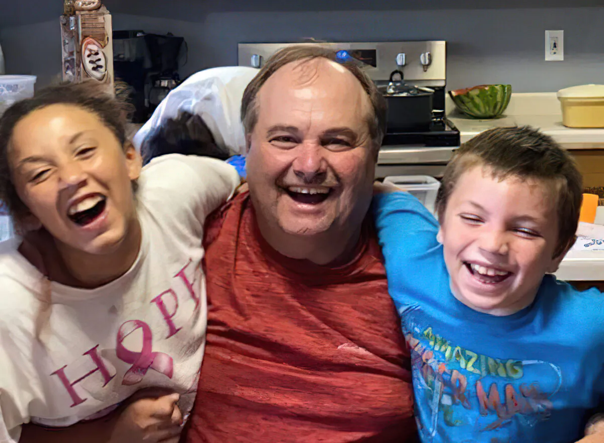 John Zingsheim of Hartford, Wis., with his children Courtney and Mitchell, who are now 21 and 19. Zingsheim is on a ventilator at Aurora Medical Center Summit while his family seeks a court order to allow treatment with the drug ivermectin. (Courtesy Zingsheim Family)