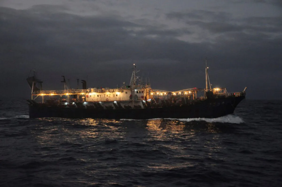 The Chinese-flagged Lu Rong Yuan Yu 609 prepares to fish for squid on the high seas near the Galapagos Islands, on July 19, 2021. (Joshua Goodman/AP Photo)