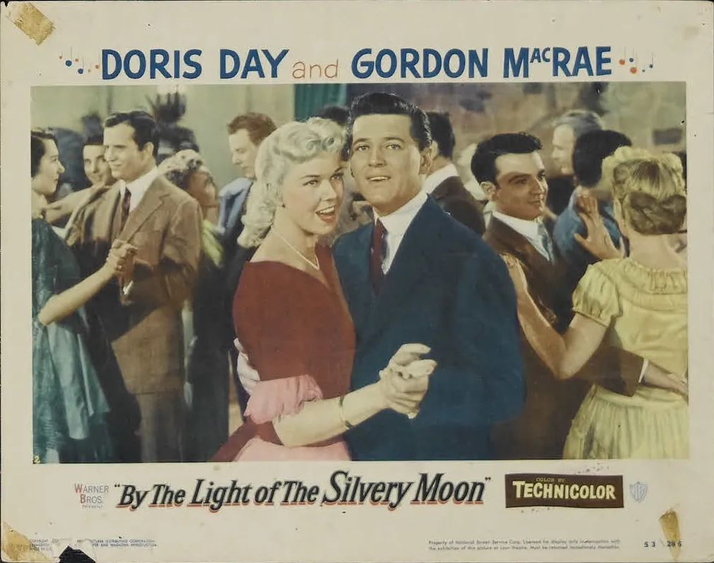 Doris Day and Gordon MacRae appear as sweethearts in both films. A lobby card for "By the Light of the Silvery Moon." (MovieStillsDB)