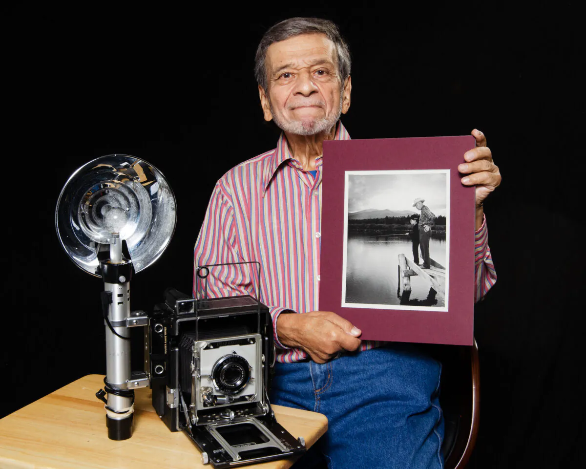 Al Freni, with his iconic photo of President Dwight D. Eisenhower and grandson David, and the Speed Graphic camera he used to shoot the picture. (Dave Paone)