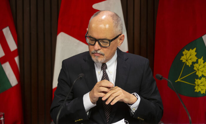 Dr. Kieran Moore, Ontario's chief medical officer, attends a media briefing   in Toronto on Nov. 29, 2021. (The Canadian Press/Chris Young)