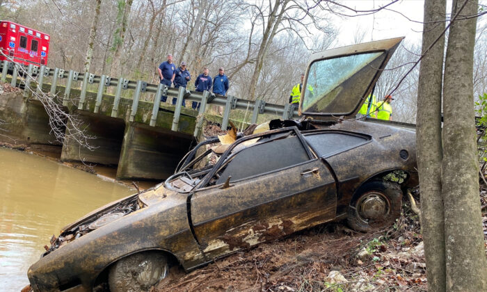 The 1974 Pinto Kyle Clinkscales was driving when he disappeared in 1976, is recovered from a creek in Alabama in December 2021. (Maj. Terry "Tj" Wood/Chambers County Sheriff's Department via AP)