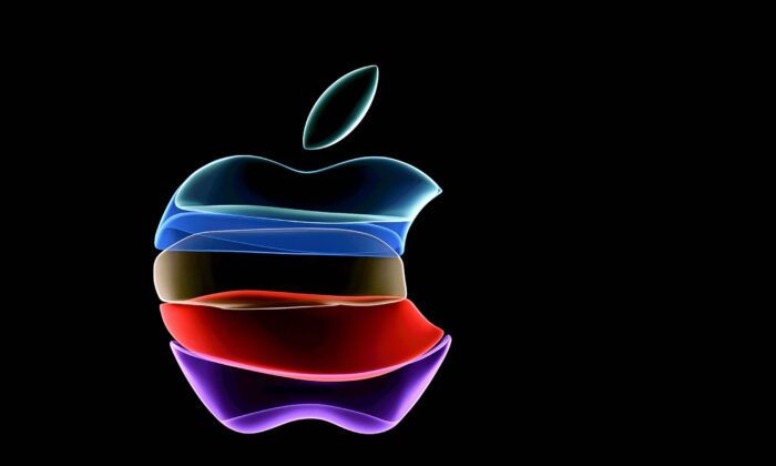 The apple logo is projected on a screen before the start of a product launch event at Apple's headquarters in Cupertino, Calif., on Sept. 10, 2019. (Josh Edelson/AFP via Getty Images) 