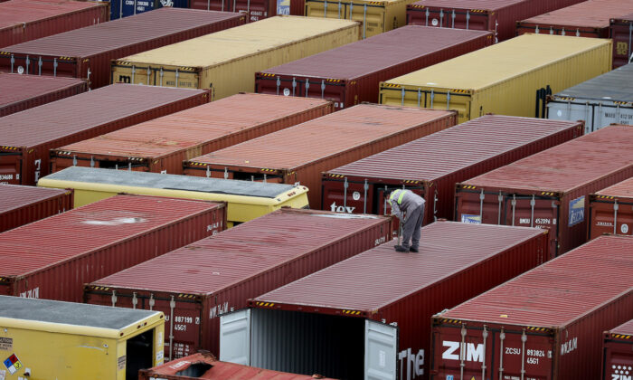 Shipping containers are stacked after being offloaded from a boat in Miami, Florida on Nov. 4, 2021. (Joe Raedle/Getty Images)
