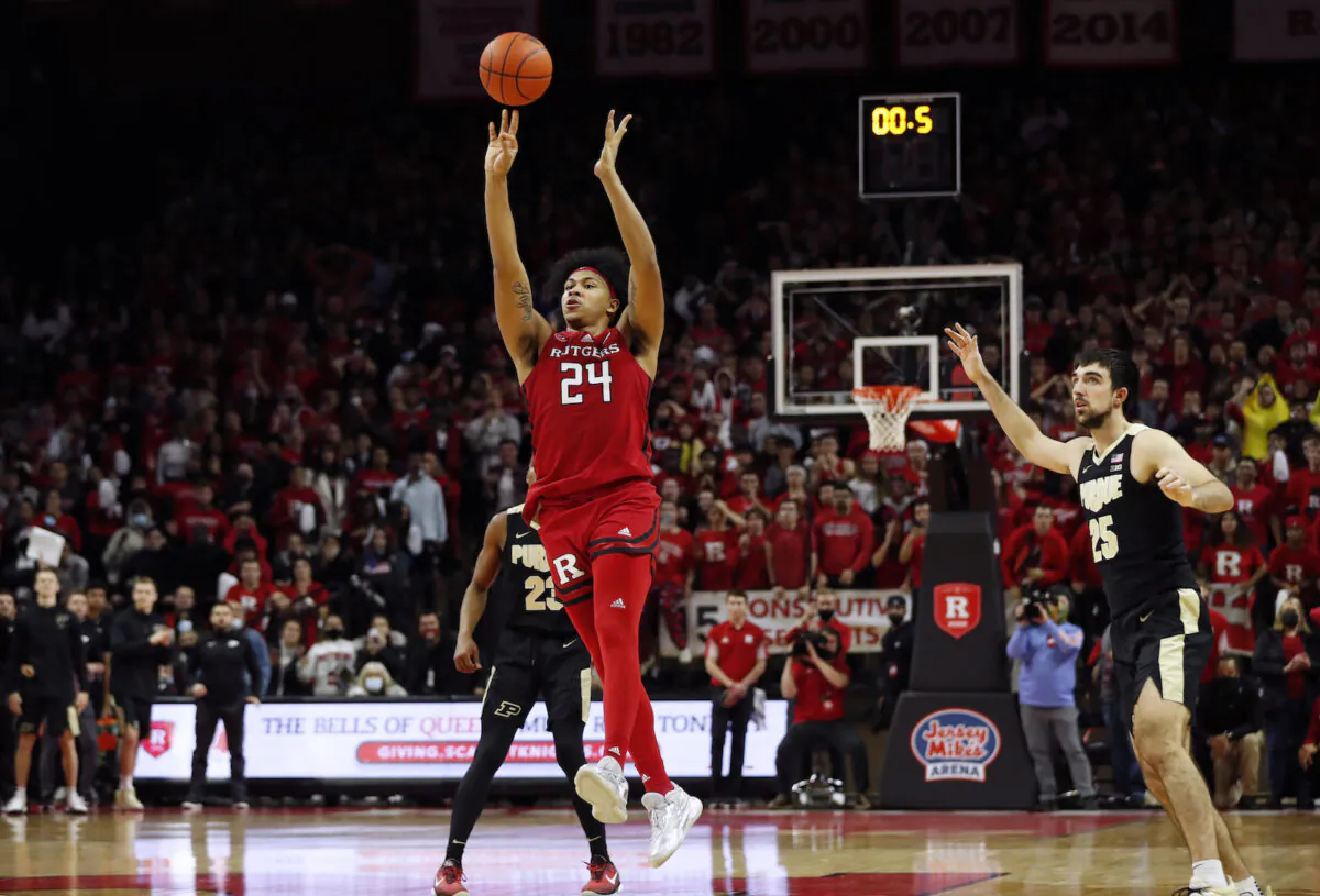 Rutgers forward Ron Harper Jr. (24) hits the game winning shot against Purdue during an NCAA college basketball game in Piscataway, N.J., on Dec. 9, 2021. (Noah K. Murray/AP Photo)