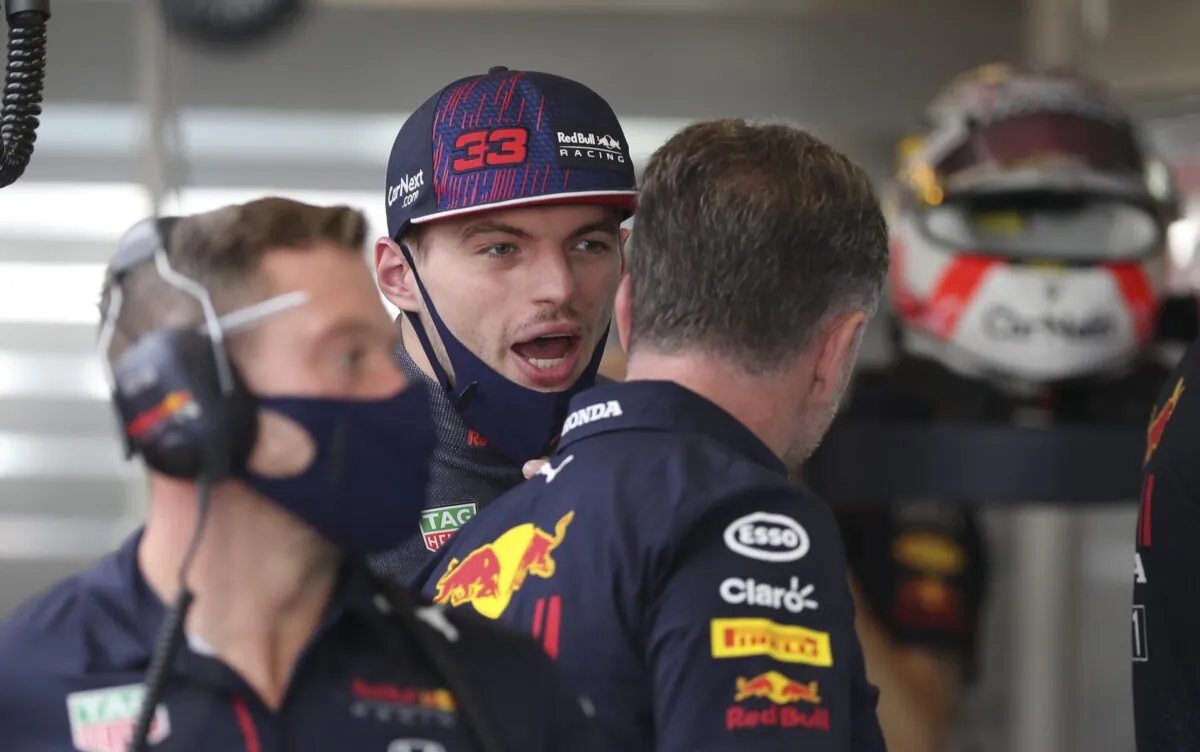 Red Bull driver Max Verstappen talks to his team members during practice for the Formula One Abu Dhabi Grand Prix in Abu Dhabi, United Arab Emirates, on Dec. 10, 2021. (Kamran Jebreili/AP Photo)