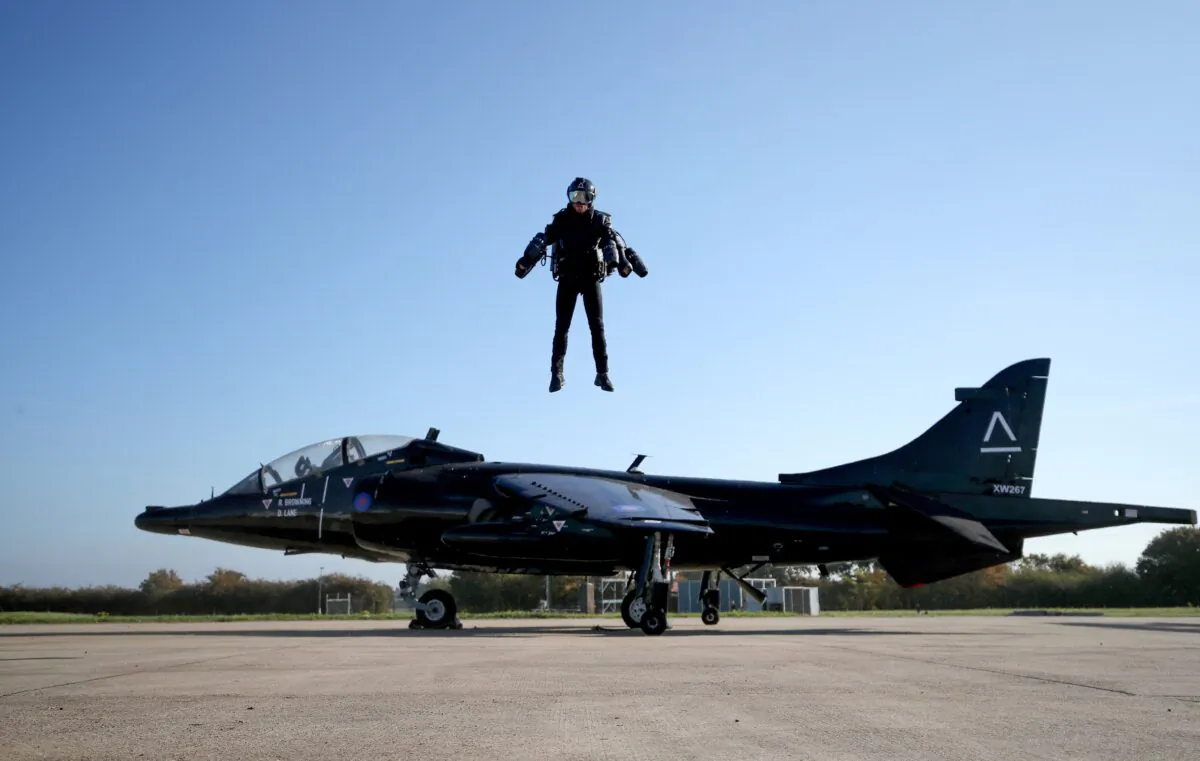 Richard Browning, Chief Test Pilot and CEO of Gravity Industries, wears a Jet Suit and flies during a demonstration flight at Bentwaters Park, in Woodbridge, Britain, on Oct. 4, 2018. (Chris Radburn/Reuters)