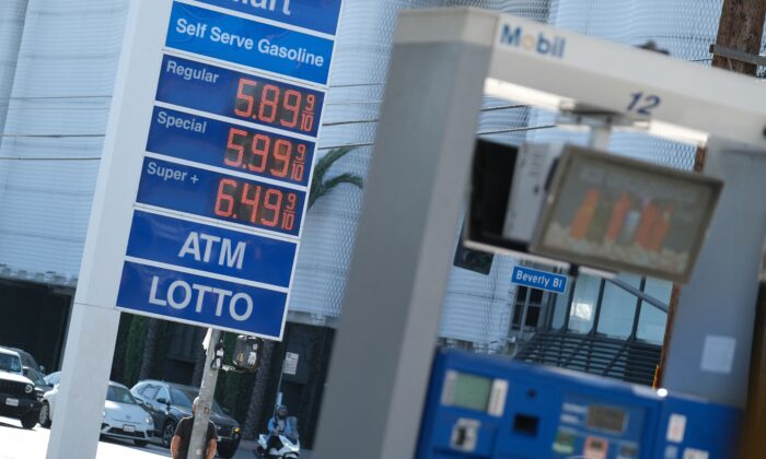 High gasoline prices are displayed at a Los Angeles gas station on Nov. 24, 2021. (Chris Delmas/AFP via Getty Images)