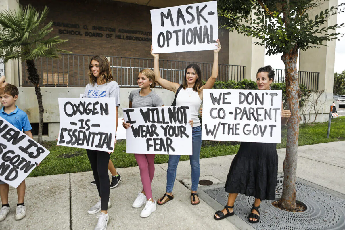 Families protest any potential mask mandates before the Hillsborough County Schools Board meeting held at the district office in Tampa, Fla., on July 27, 2021. (Octavio Jones/Getty Images)