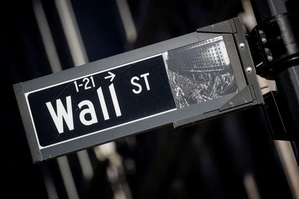 A street sign for Wall Street is seen in the financial district in New York, on Nov. 8, 2021. (Brendan McDermid/Reuters)