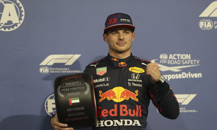 Red Bull driver Max Verstappen of the Netherlands celebrates after winning the pole position for the Formula One Abu Dhabi Grand Prix in Abu Dhabi, United Arab Emirates, on Dec. 11, 2021. (Kamran Jebreili, Pool/AP Photo)