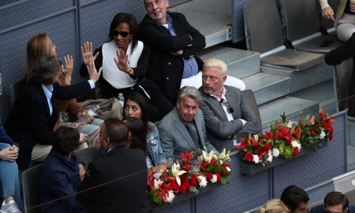 Former Tennis players Boris Becker and Manuel Santana in the stands during the final between Czech Republic's Petra Kvitova and Netherlands' Kiki Bertens, in Madrid, Spain, on May 12, 2018. (Sergio Perez/Reuters)