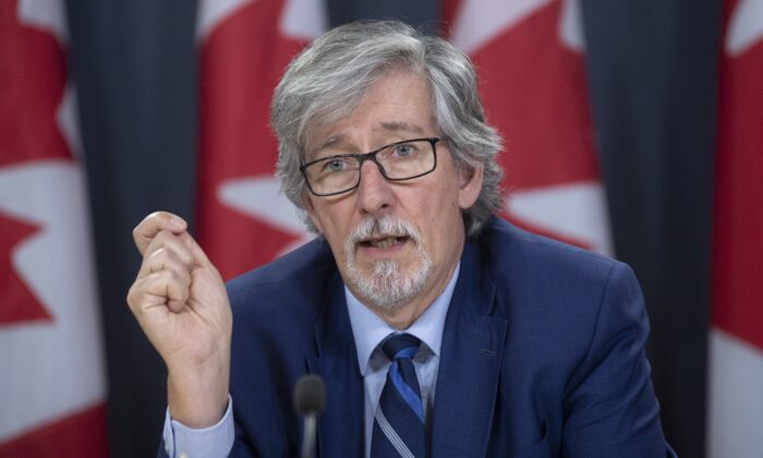 Privacy Commissioner Daniel Therrien speaks during a news conference in Ottawa on Dec. 10, 2019. (Adrian Wyld/The Canadian Press)