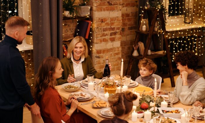 A family gathering for the holidays. (Nicole Michalou/Pexels)