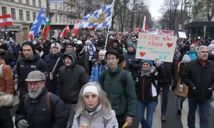 Thousands protest COVID-19 policies in capital of Austria, on Dec. 11, 2021, in a still from video. (AP/Screenshot via The Epoch Times)