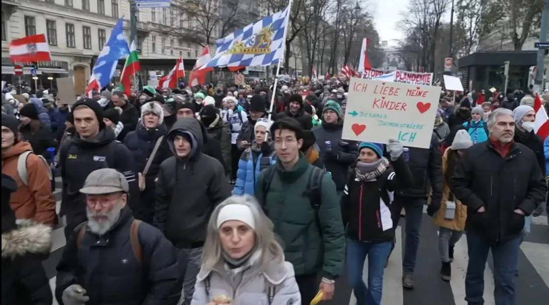 Thousands protest COVID-19 policies in capital of Austria, on Dec. 11, 2021, in a still from video. (AP/Screenshot via The Epoch Times)
