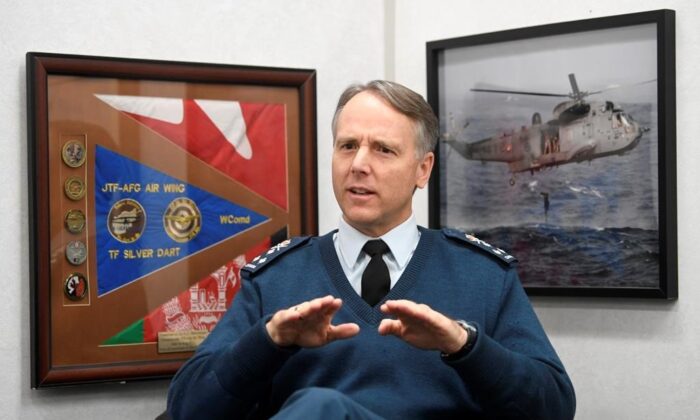 Commander of the Royal Canadian Air Force Al Meinzinger is seen during an interview with The Canadian Press in his office at National Defence headquarters in Ottawa, Dec. 12, 2019. (The Canadian Press/Adrian Wyld)
