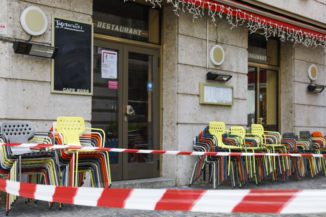 Due to the lockdown, restaurants are closed and seats are blocked off in Vienna, Austria, on Nov. 30, 2021. (Lisa Leutner /AP Photo)