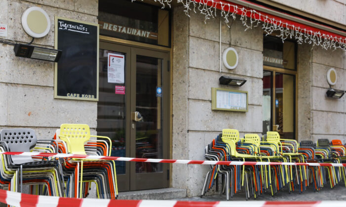 Due to the lockdown, restaurants are closed and seats are blocked off in Vienna, Austria, on Nov. 30, 2021. (Lisa Leutner /AP Photo)