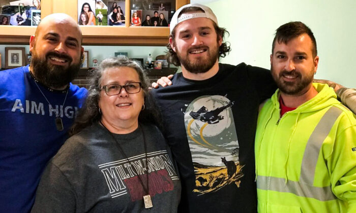 Coleen DeLuca with her two sons, David on the left and Jonathan on the right and  in the middle, Dominic, one of 10 grandchildren.  (Courtesy David DeLuca)  